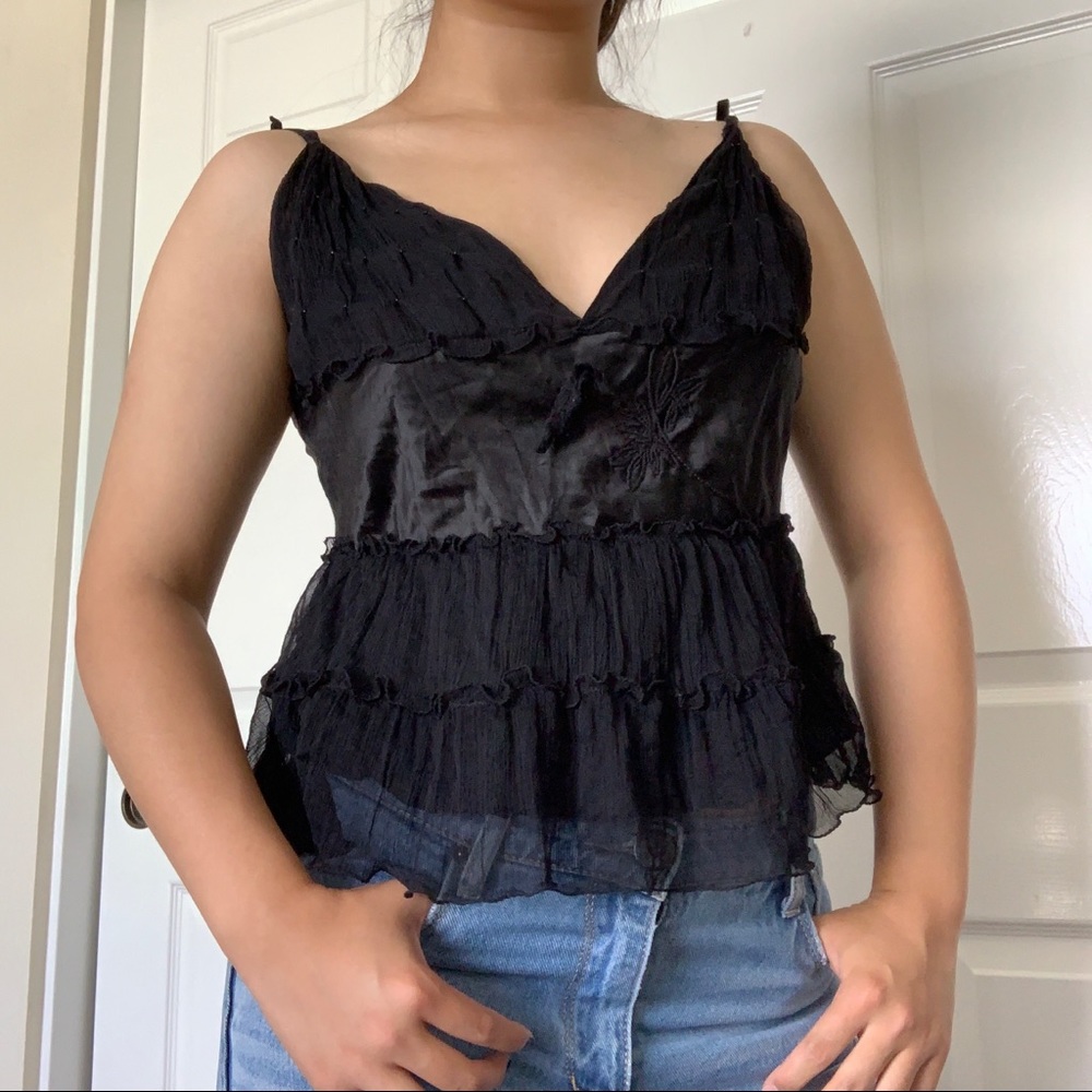Black silk top.